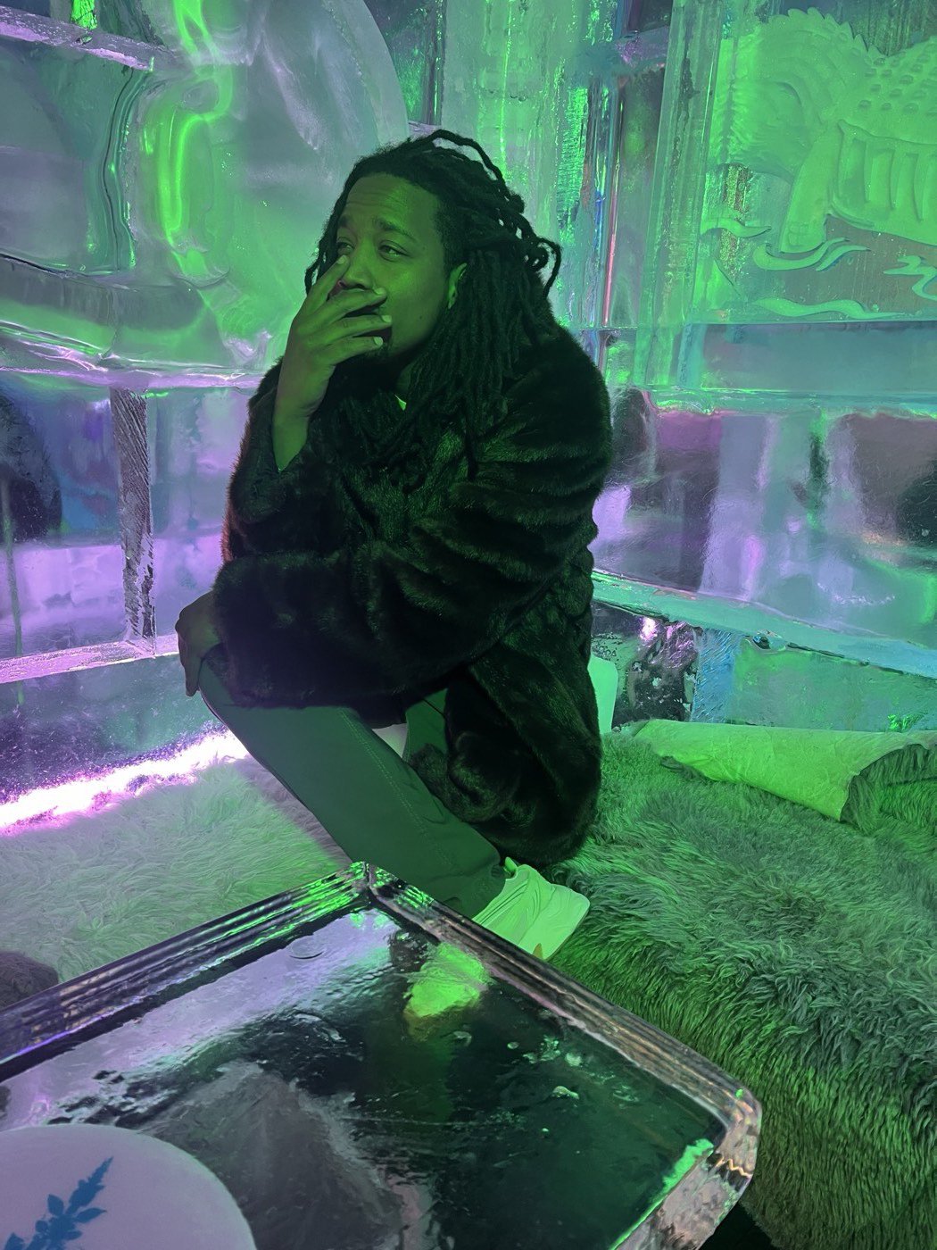 Sl1ck N°1 at an ice bar with colored lighting